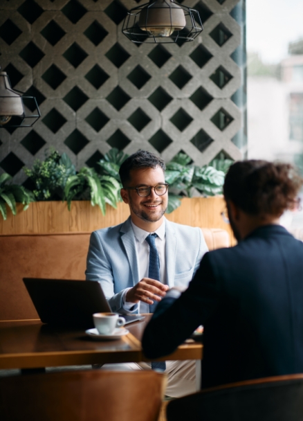 Business people talking in cafe